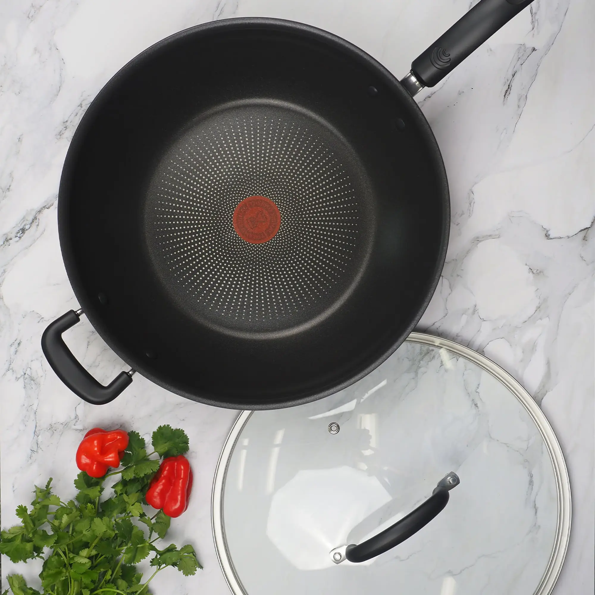 Tefal Specialty Hard Anodised Non-Stick Wok 32cm + Lid on kitchen bench with lid removed