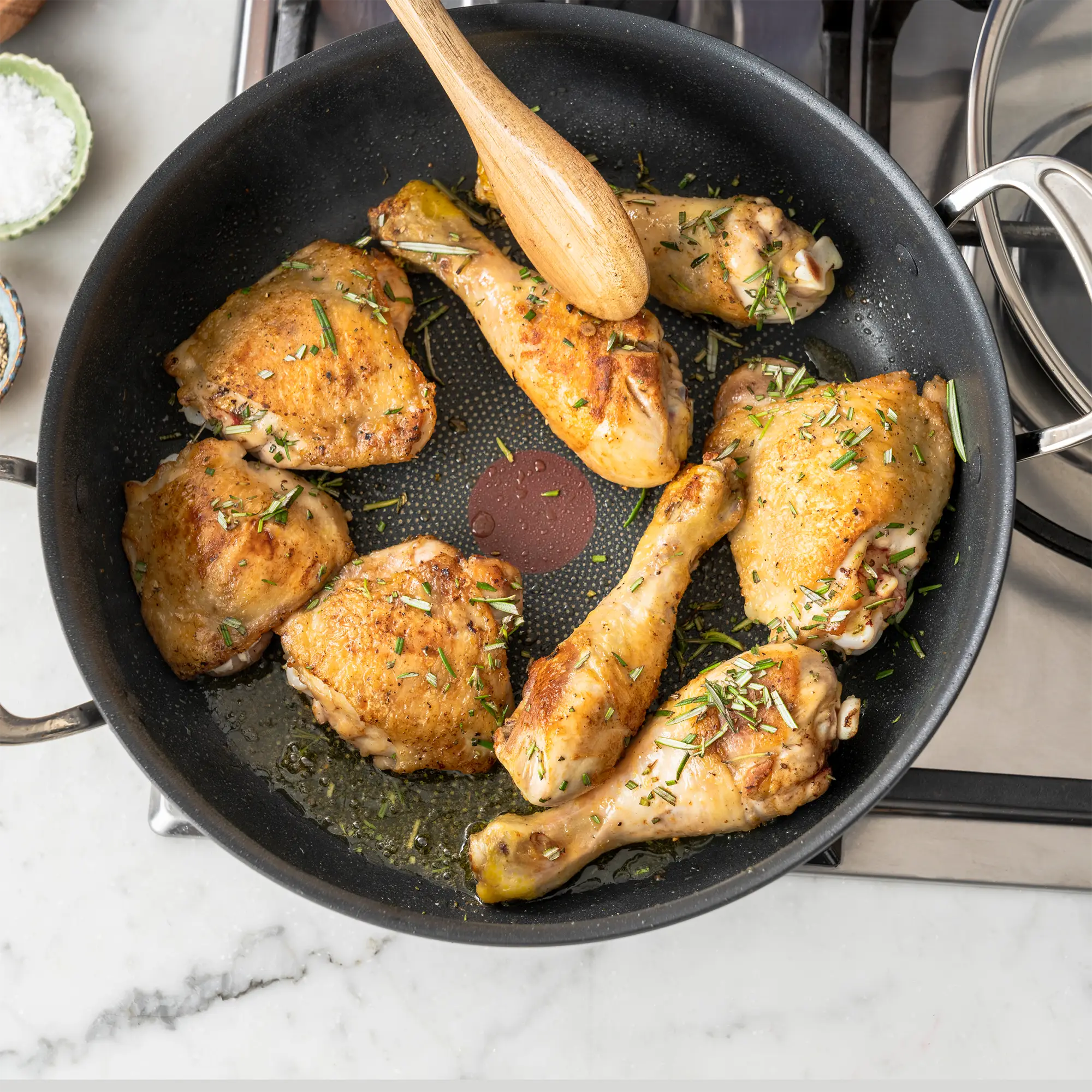 Jamie Oliver by Tefal Cooks Classic Induction Non-Stick Hard Anodised All-In-One Pan 30cm cooking chicken