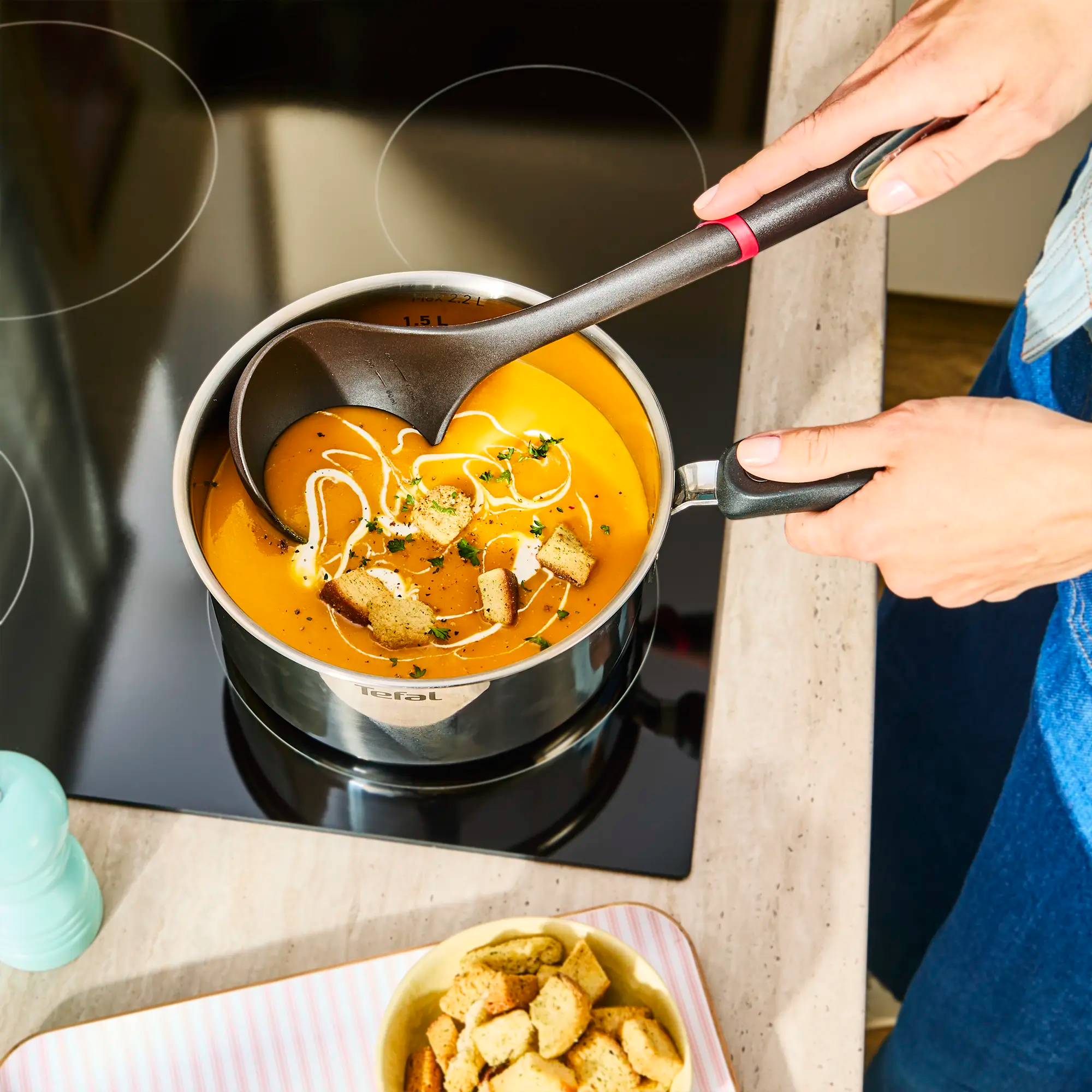 Tefal Space+ Everyday Chef Induction Stainless Steel Saucepan + Lid on induction cooktop with soup