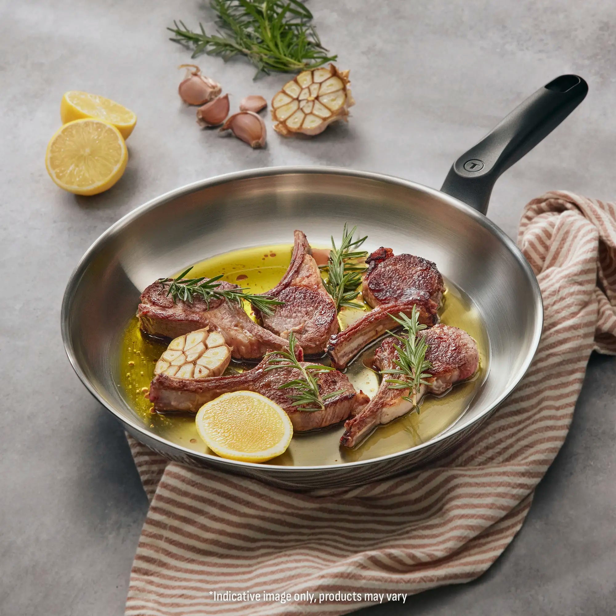 Tefal Everyday Chef Induction Uncoated Stainless Steel Frypan with cooked meat