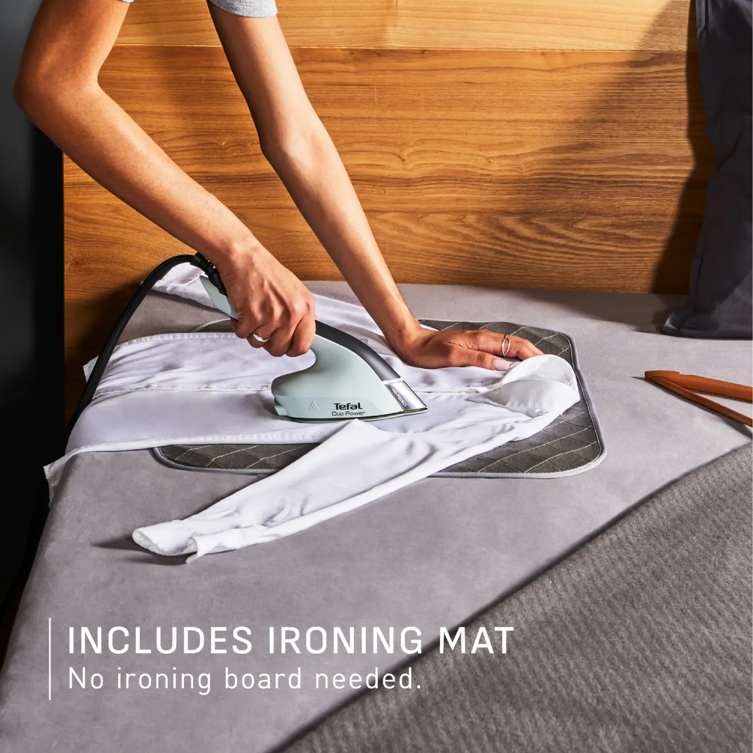 Tefal Duo Power Iron & Steamer JF4031 includes ironing mat; no ironing board needed.