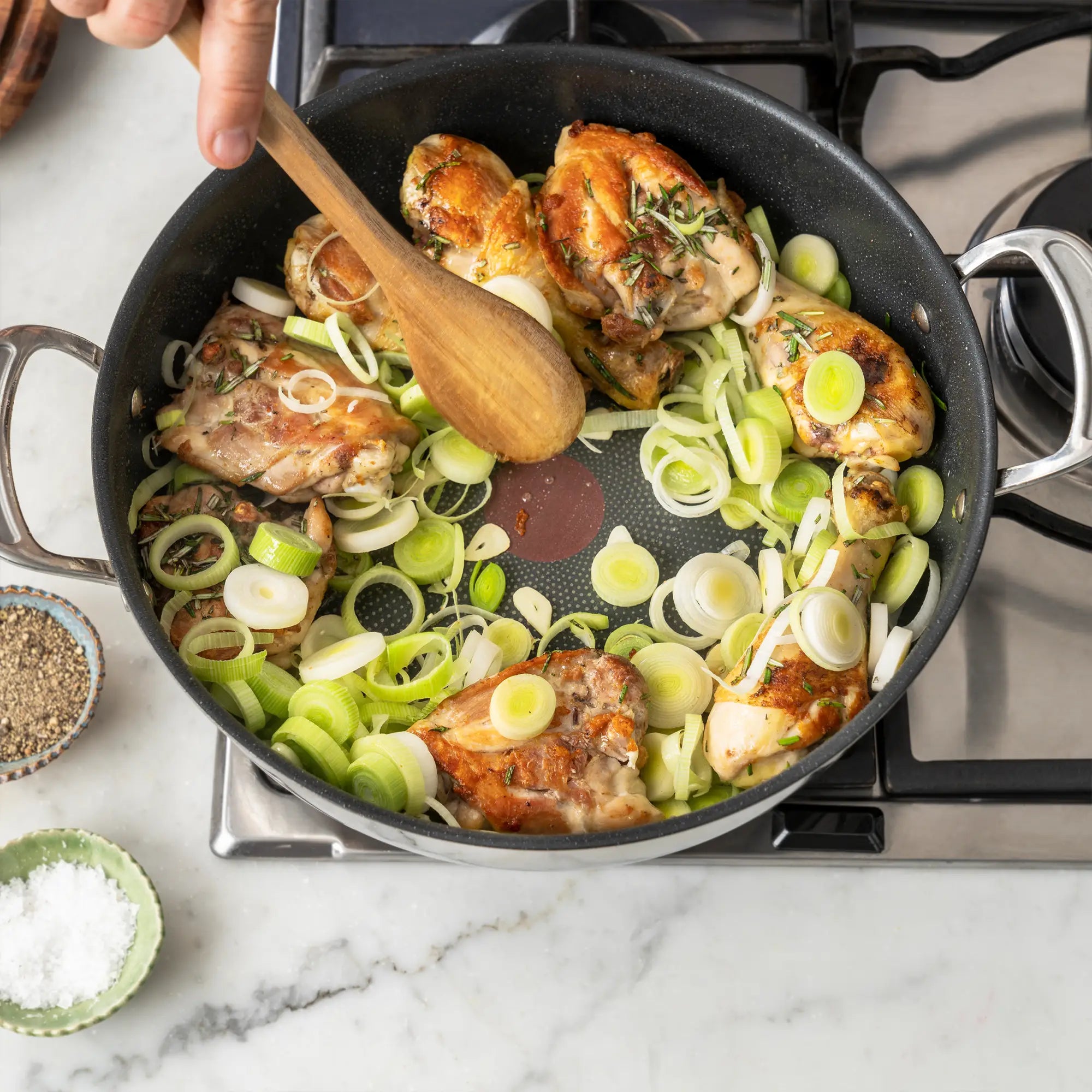 Chicken coooking in Jamie Oliver by Tefal Cooks Classic Stainless Steel Non-stick Induction Shallowpan 30cm